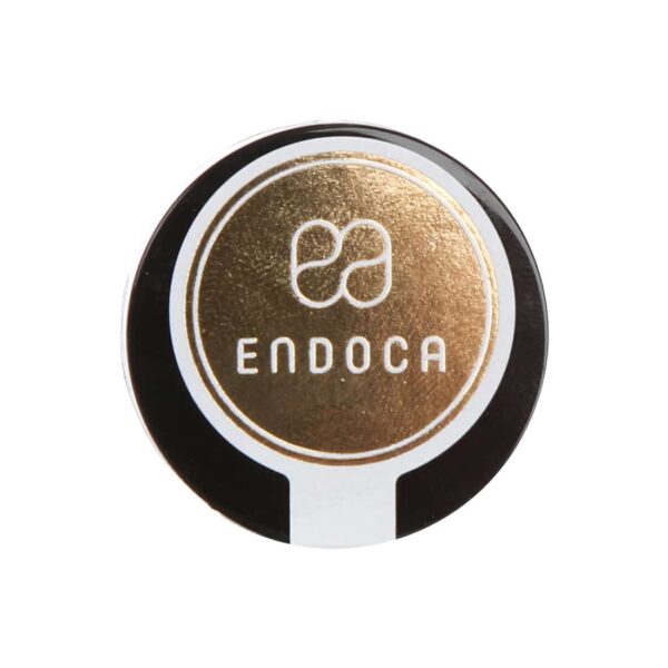 Ein schwarz-goldener Knopf mit dem Produktnamen Endoca CBD Kristalle 98 % (500 mg reines CBD).